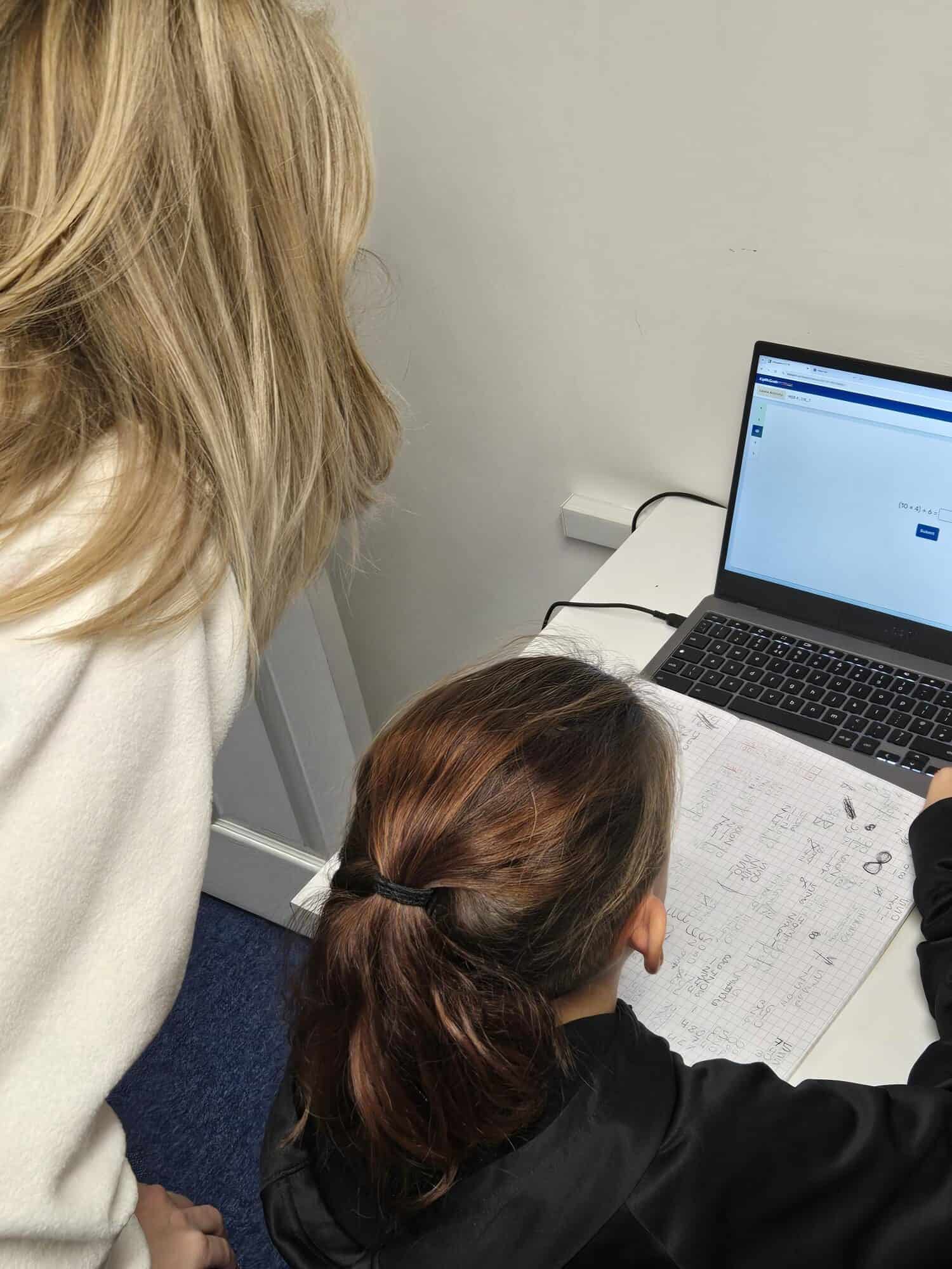 Maths tutoring session with students